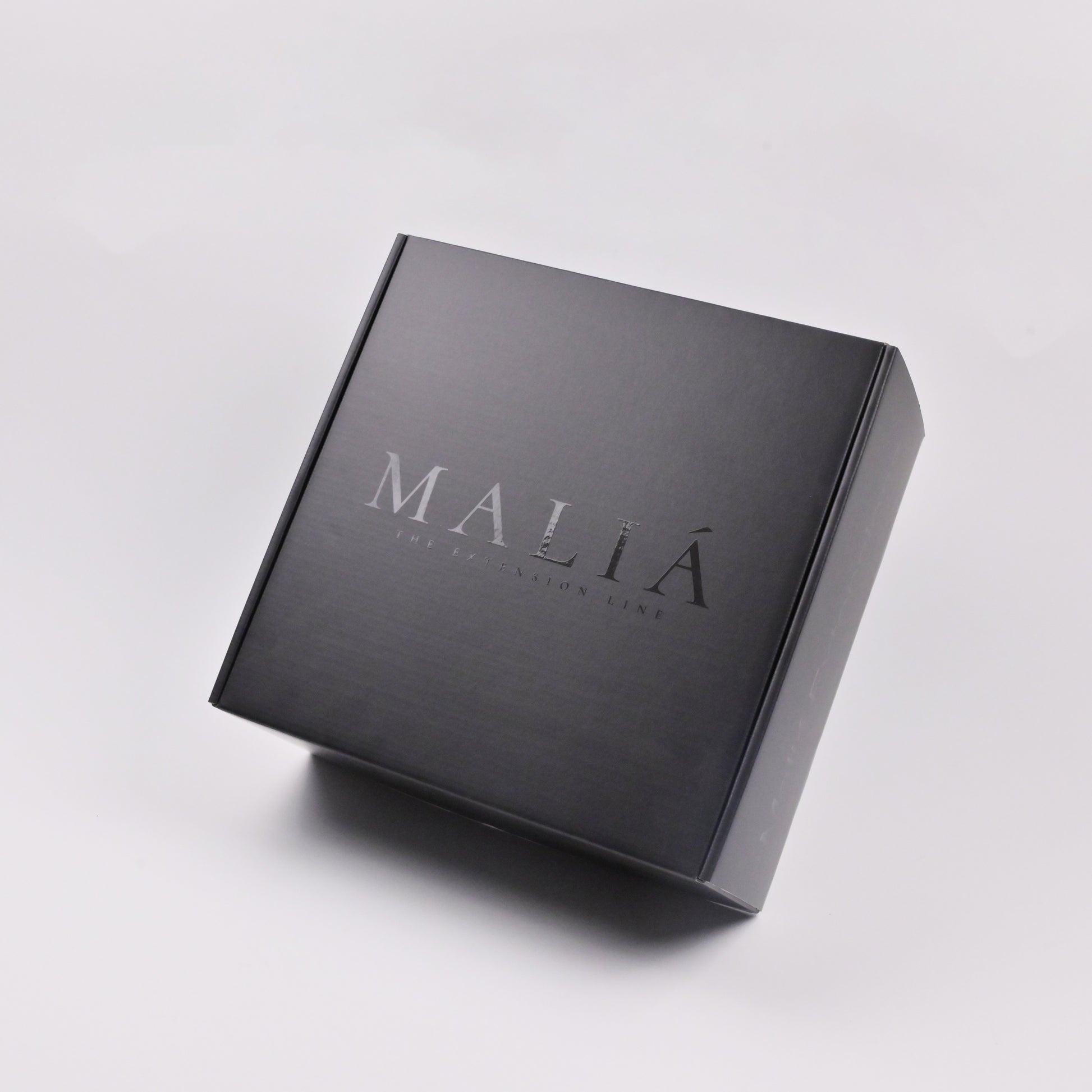 Black corrugated mailer box with clean flat surface for custom printing