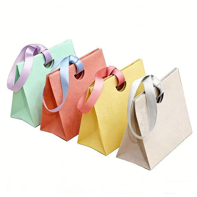Luxury ribbon handles paper shopping bag custom print wholesale